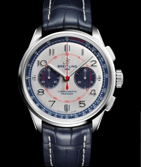 The blue sub-dials and red elements are striking on the silver dial.